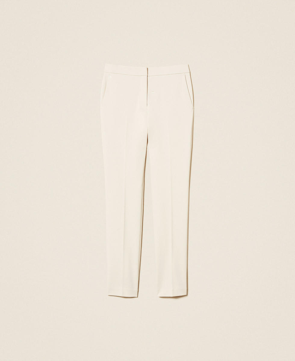 Pantalon cigarette avec pli marqué